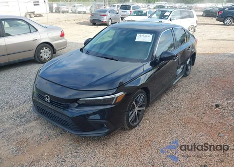 2023 Honda Civic Touring z USA, uszkodzony, nr VIN 2HGFE1F91PH320653